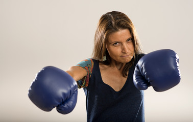 Adult woman in boxing gloves