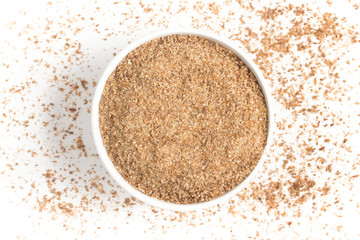 Ground Wheat into a spoon. Trigo para quibe. Kibbeh