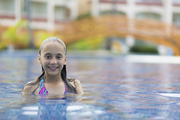 Happy Girl in the Swimming Pool