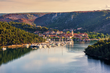 Small cozy town of Skradin on Krka river in a gentle morning light, the entrance to the Krka National Park, Dalmatia, Croatia