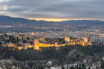 Panorama of Alhambra palace and fortress complex at dusk in Granada. Andalusia. Spain