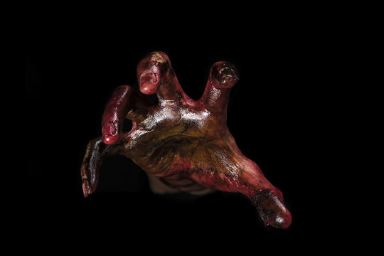 blood zombie hands on back background,zombie theme, halloween th
