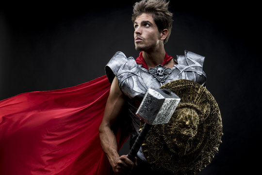 centurion or Roman warrior with iron armor, military helmet with
