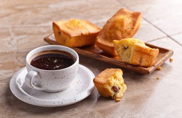 coffee and cupcake with raisins