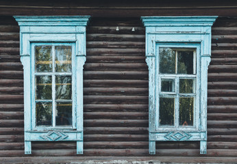 Fototapeta na wymiar Window of old wooden house