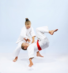 Judo athletes are training throws