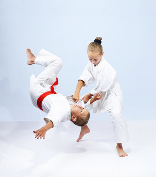 Children athletes train judo throws