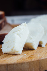 Traditional indian cheese panneer with pieces of bread