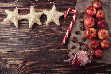 Christmas apples with candy cane and stars anise with festive de