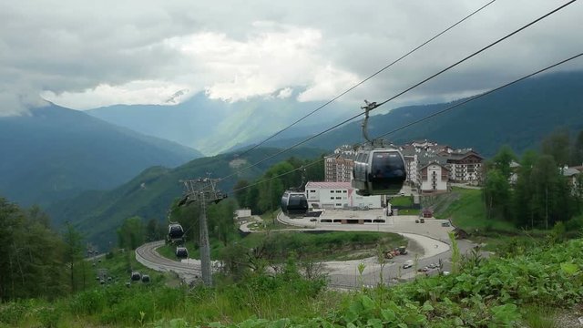 Cabin of ropeway pass over Olympic village Rosa Khutor where played winter Olympic Games in 2014
