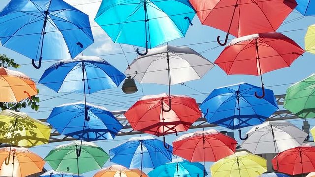 Street decorated with colored umbrellas
