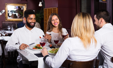 Group having dinner in restauran
