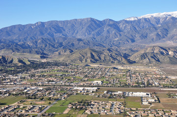 Fototapeta na wymiar An aerial view of the town of Banning which lies at the base of Mount San Gorgonio in southern California.