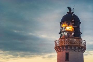 Lighthouse beacon at dusk