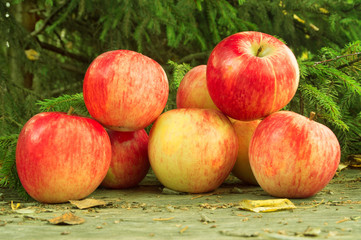 Ripe apples in wooden background. Healthy food. Healthy eating. Vegetarian food. Healthy eating concept. Fresh fruits. Fresh apples.