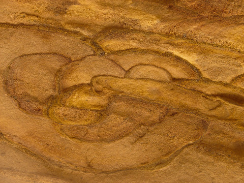 unusual pattern on sand colored walls of the canyon in Egypt