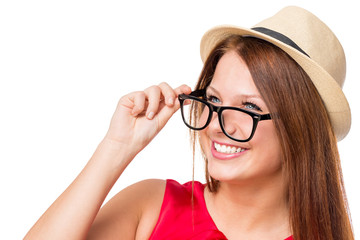 girl with a beautiful smile wearing glasses and a hat on a white