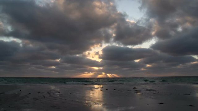 Time lapse cloudy Sunset at the beach in Geraldton , Western Australia