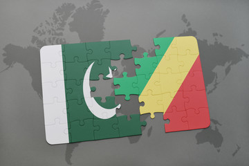 puzzle with the national flag of pakistan and republic of the congo on a world map background.