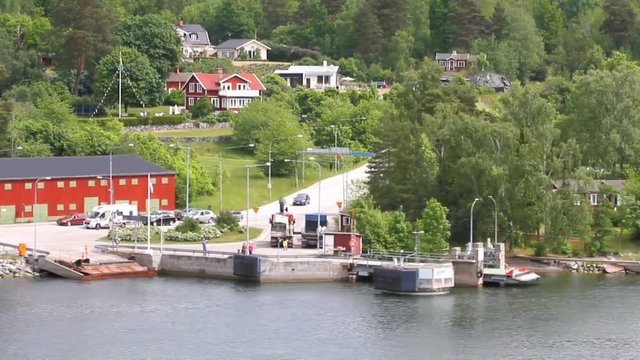 Ferry mooring and coast of fjord in Scandinavia. Stockholm, Sweden
