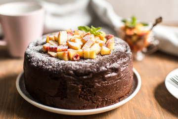 Chocolate cake with peach jam