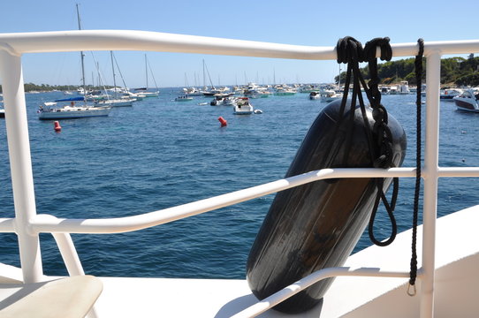 Fototapeta Boat fender on a yacht in the harbor