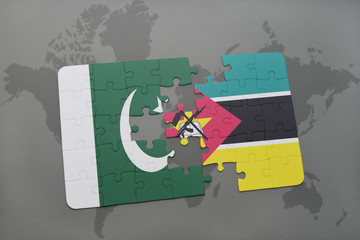 puzzle with the national flag of pakistan and mozambique on a world map background.