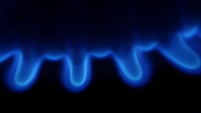 Blue flame from a gas burner. Close up