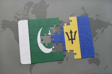 puzzle with the national flag of pakistan and barbados on a world map background.