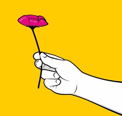Hand holding flower
