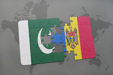 puzzle with the national flag of pakistan and moldova on a world map background.