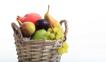Variety of fresh fruits on white background