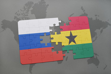 puzzle with the national flag of russia and ghana on a world map background.