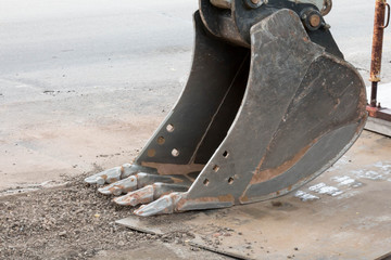 Close up of the metal bucket on an excavator