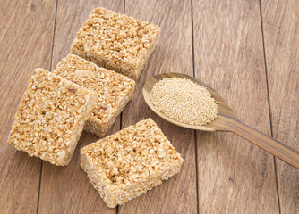 Amaranth bars in the wooden background