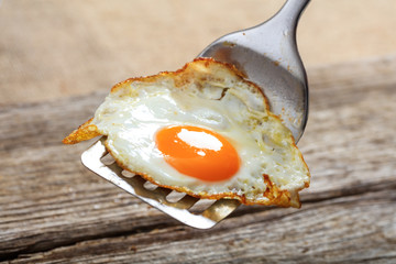 Fried egg in a server