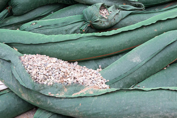 Full frame runoff control bags filled with gravel
