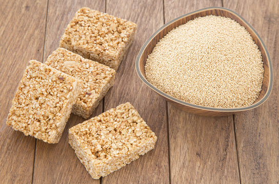 Amaranth bars in the wooden background