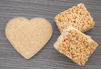 Amaranth bars in the wooden background