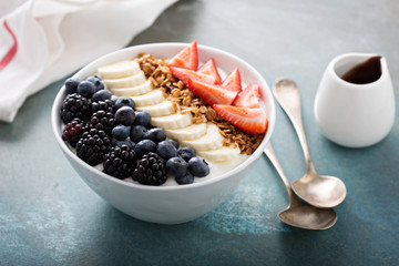 Yogurt bowl with banana and berries