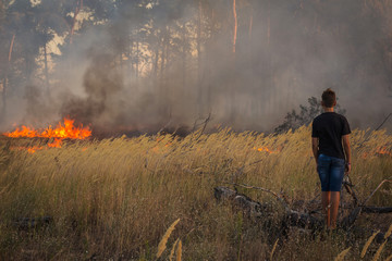 wildfire. danger, a person near fire