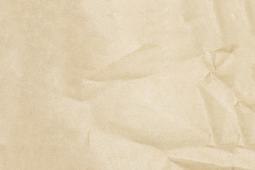 Recycled crumpled brown paper texture or paper background for design with copy space for text or image.