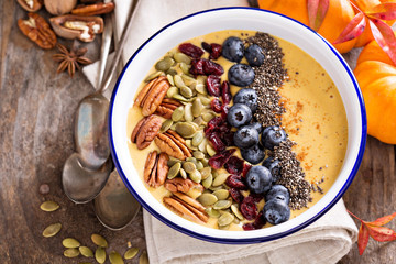 Pumpkin smoothie bowl with nuts and seeds
