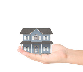 Mortgage concept by house from hand