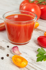 Tomato juice and vegetables with spices, healthy nutrition