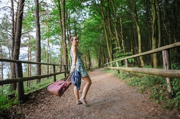 Young girl on a walk in the forest