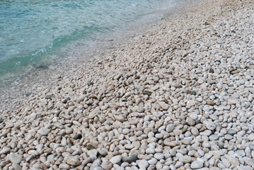 Pebble beach in Montenegro. Landscape. Travel in Europe.