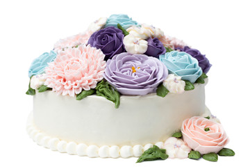 Birthday cake with colorful flowers isolated