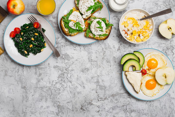 Different healthy food on a light surface with copy space