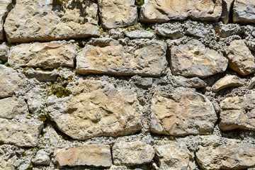 gray-brown background, texture stone masonry closeup